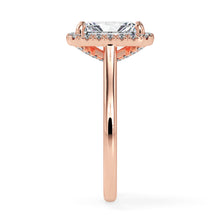 Rose gold radiant engagement ring with halo
