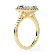 Yellow gold radiant engagement ring with halo