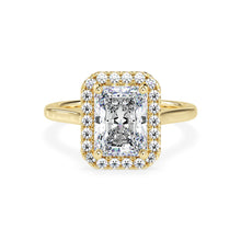 Yellow gold radiant engagement ring with halo
